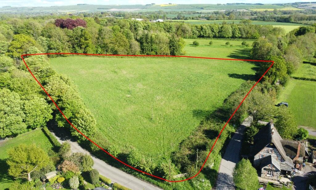 how much is development land worth per acre